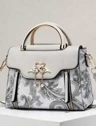 geantă de mână elegantă cu pandantiv cu lebădă - design paisley alb-negru cu accente aurii și curea reglabilă