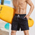 economico Beach Shorts-Per uomo Boxer da surf Pantaloncini da mare Boxer da mare Pantaloncini estivi Pantaloncini da spiaggia A cordoncino con fodera in rete Vita elastica Albero di cocco Stampe astratte Asciugatura rapida