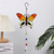 abordables Hasta 30 $-1 carillón de viento pintado con colibrí, artesanía para exteriores que brilla en la noche, adorno colgante para ventana, balcón, decoración de jardín