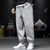 abordables Survêtements de sport-Homme Joggings Pantalon Jogging Pantalon à déchirer Pantalon Poche Plein Confort Respirable Extérieur du quotidien Sortie Mode Décontractées Noir Grise