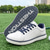 billige Herresko til golf-hvite og svarte ytelsesgolfsneakers for menn, slitesterk mikrofiberkonstruksjon, ideell for hverdagsgolfere