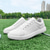 billige Herresko til golf-hvite og svarte ytelsesgolfsneakers for menn, slitesterk mikrofiberkonstruksjon, ideell for hverdagsgolfere