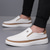 abordables Chaussures Décontractées Slip-On-Baskets blanches à enfiler pour homme avec détails en PU – chaussures légères et tendance pour le streetwear, les voyages et les tenues décontractées