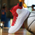 abordables Baskets Décontractées-Baskets de basket montantes rouges et blanches pour hommes avec absorption des chocs – confort et durabilité haut de gamme pour des performances sportives