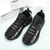 preiswerte Herren Laufschuhe-Grüne Herren-Laufschuhe mit auffälligem Schriftzug – bequem, leicht, ideal zum Laufen, fürs Fitnessstudio und für einen aktiven Lebensstil.