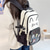 preiswerte Kinder- und Teenager-Rucksäcke-Kawaii-Rucksack mit Katzenohren für Mädchen – süße rosa Schultasche mit durchsichtiger Sichttasche und Cartoon-Ansteckern für Teenager und Kinder