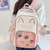 preiswerte Kinder- und Teenager-Rucksäcke-Kawaii-Rucksack mit Katzenohren für Mädchen – süße rosa Schultasche mit durchsichtiger Sichttasche und Cartoon-Ansteckern für Teenager und Kinder