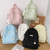 cheap College Backpacks-Women’s Light Green Textured School Backpack with Cute Teddy Bear Keychain, Large Capacity Lightweight Bookbag for Teen Girls, College, and Casual Daily Use