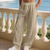 preiswerte Urlaub-Herren Leinenhosen Hose Strandhose Kordelzug Tasche Elastischer Bund Einfach Komfort Atmungsaktiv Täglich Strand Urlaub Hawaiianisch Boho Weiß Marineblau