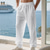 ieftine Vacanţă-Bărbați Pantaloni de in Pantaloni Pantaloni de vară Pantaloni de plajă Cordon Buzunar Talie elastică Simplu Confort Respirabil Zilnic Plajă Vacanță Hawaiană Boho Roșu Pepene Kaki Deschis