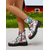 abordables Botas de combate-Botas de combate negras con estampado floral para mujer: cierre con cordones, cremallera lateral y suela gruesa con tacos. Calzado elegante para uso casual y festivalero.