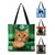 abordables Sacs à imprimés graphiques-Sac cabas de Noël pour femme, motif flocons de neige verts et jacquard, en polyester floqué, avec un chat roux festif, idéal pour les achats de Noël et les cadeaux.