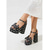 voordelige Platform Sandalen-Opvallende zwarte platform sandalen met stippen voor dames - elegante blokhakken met strikdetail en enkelbandje voor luxe resortavonden, galadiners en bruiloften.