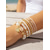 economico Accessori per le vacanze-Set di bracciali da donna in stile bohémien a più strati, realizzati in lega e resina, con ciondoli a forma di stella marina e conchiglia, perfetti per le vacanze al mare e per l'uso quotidiano.