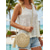 abordables Sacs de voyage pour vacances-Sac bandoulière rond bohème pour femme en paille tressée avec pompon, coloris beige et kaki, cabas d'été léger, idéal pour les vacances, les voyages et le quotidien.