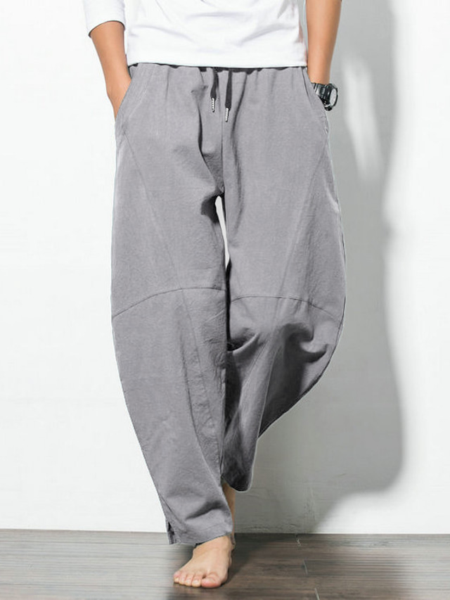  calças de harém masculinas calças curtas bolsos com cordão elástico na cintura e bloomers folgados calças casuais de ioga simples e soltas de cor sólida