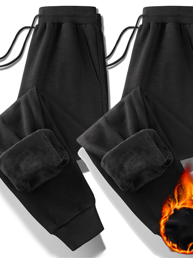 Męskie Spodnie polarowe Spodnie dresowe Spodnie zimowe Spodnie Ściągana na sznurek Elastyczny pas Jednokolorowe Komfort Ciepłe Codzienny Streetwear Mieszanka bawełny Sport Moda Czarny Średnio
