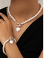 abordables Collar de mujer-Conjunto de collar y pulsera de perlas rojas para mujer con colgante de corazón, diseño de cierre en tono dorado, joyería elegante para regalo de San Valentín, bodas y ocasiones especiales.