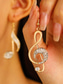abordables Pendiente de mujer-Pendientes de nota musical de oro con detalles de diamantes de imitación: elegantes joyas colgantes para mujeres, perfectas para conciertos, fiestas y ocasiones especiales.