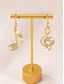 abordables Pendiente de mujer-Pendientes de nota musical de oro con detalles de diamantes de imitación: elegantes joyas colgantes para mujeres, perfectas para conciertos, fiestas y ocasiones especiales.