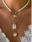 abordables Collar de mujer-Conjunto de collar bohemio de conchas y cuentas en capas para mujer: colgante turquesa estilo playa y dijes dorados para vacaciones de verano y festivales.