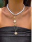 abordables Collar de mujer-Conjunto de collar bohemio de conchas y cuentas en capas para mujer: colgante turquesa estilo playa y dijes dorados para vacaciones de verano y festivales.