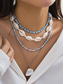 abordables Collar de mujer-Conjunto de collar bohemio de conchas y cuentas en capas para mujer: colgante turquesa estilo playa y dijes dorados para vacaciones de verano y festivales.