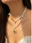 abordables Collar de mujer-Conjunto de collar bohemio de conchas y cuentas en capas para mujer: colgante turquesa estilo playa y dijes dorados para vacaciones de verano y festivales.
