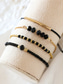 economico Bracciale da donna-Set di braccialetti da donna in stile bohémien con perline nere, decorazioni in oro, gioielli regolabili, alla moda e di tendenza, adatti per l'uso quotidiano, per i viaggi e per le feste