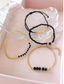 economico Bracciale da donna-Set di braccialetti da donna in stile bohémien con perline nere, decorazioni in oro, gioielli regolabili, alla moda e di tendenza, adatti per l'uso quotidiano, per i viaggi e per le feste