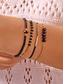 economico Bracciale da donna-Set di braccialetti da donna in stile bohémien con perline nere, decorazioni in oro, gioielli regolabili, alla moda e di tendenza, adatti per l'uso quotidiano, per i viaggi e per le feste