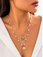 abordables Collier pour femme-Collier de plage d'été pour femme avec breloques en perles, coquillages et étoiles de mer – collier superposé plaqué or pour les vacances, les tenues décontractées et les occasions spéciales
