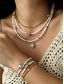 abordables Collar de mujer-Conjunto de collar y pulsera tobillera en capas estilo playa para mujer con dijes de estrellas de mar y conchas, diseño de cuentas doradas y blancas, adecuado para vacaciones de verano, estilo casual y bohemio.