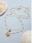abordables Collier pour femme-Collier de plage d'été pour femme avec breloques en perles, coquillages et étoiles de mer – collier superposé plaqué or pour les vacances, les tenues décontractées et les occasions spéciales