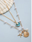 abordables Collier pour femme-Collier de plage d'été pour femme avec breloques en perles, coquillages et étoiles de mer – collier superposé plaqué or pour les vacances, les tenues décontractées et les occasions spéciales