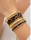 economico Bracciale da donna-braccialetti da donna in lega color oro con stampa leopardata – set da 4, elegante design con stampa animalier, perfetti per un abbigliamento casual e da sera