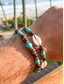 abordables Joyas para hombres-Conjunto de dos pulseras bohemias para hombre, con cuentas de madera, turquesa y conchas, ideales para vacaciones en la playa y para el día a día.