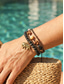 abordables Bracelet pour femme-Bracelet bohème pour femme, composé de plusieurs bracelets à breloques en alliage avec pendentif éléphant, bijou de poignet bohème fait main, accessoire ajustable pour les vacances d'été à la plage,