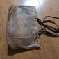 bolsa vintage marrom de couro sintético com alças trançadas e detalhes de borla - ideal para uso diário e passeios casuais