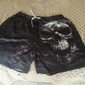 Shorts de sudation actifs pour hommes avec imprimés tête de mort shorts en éponge taille moyenne mode streetwear classique style sportif extérieur décontracté quotidien avec cordon de serrage et